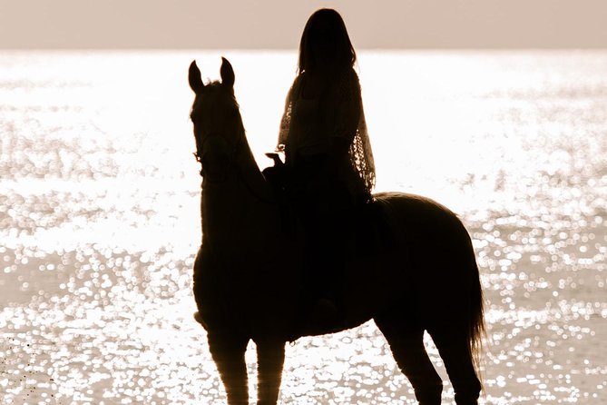 Santorini: Horse Riding to the Black Sandy Beach (Eros beach) - The helmet-and-saddle setup: why it makes the ride better