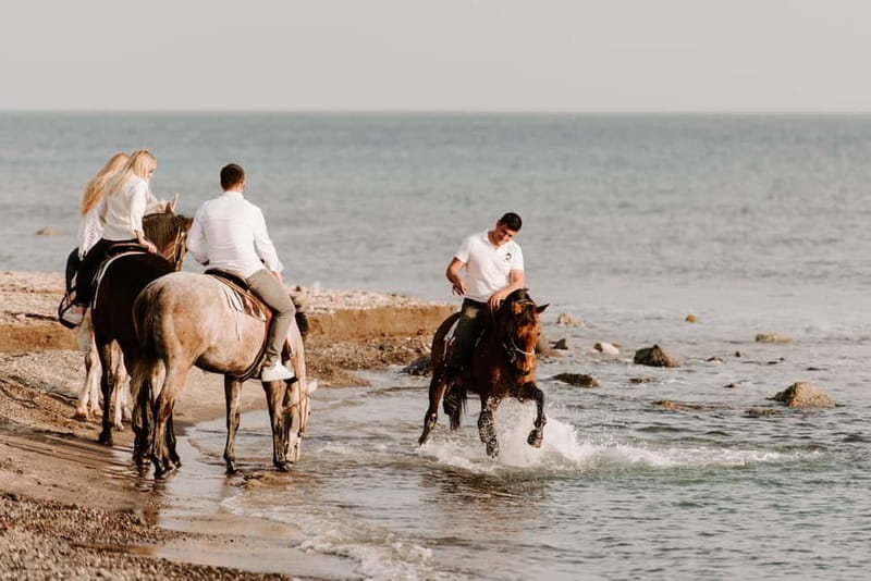 Santorini: Horseback Riding on the Black Sandy Eros Beach - What You Actually Get: Gear, Water, and Phone Photos