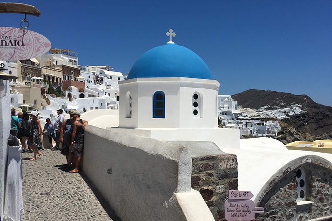 Santorini: Local Life Full Day Tour - Oia streets, blue domes, and cave houses