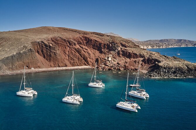 Santorini: Luxury Catamaran Cruise with Fresh Fish BBQ & Drinks - Red Beach and the Boat-Only Color Shift You’ll Remember