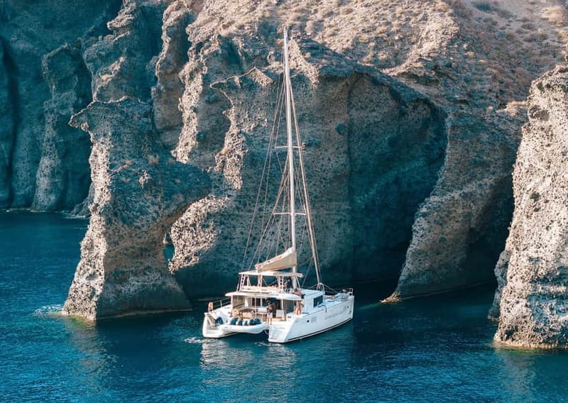 Santorini: Luxury Catamaran Cruise with Lunch, BBQ & Drinks - Mesa Pigadia swim stop: when the day turns from watching to doing
