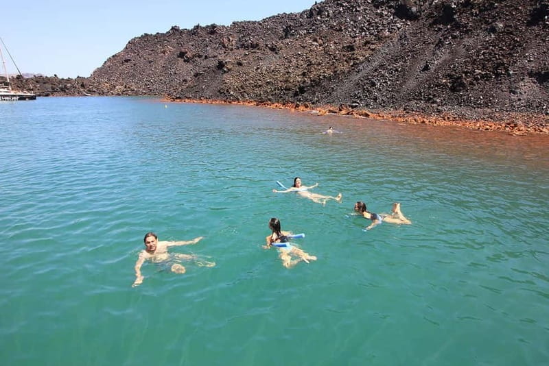 Santorini: Luxury Catamaran Cruise with Lunch, BBQ & Drinks - Thirasia island time: a calmer feel plus lunch and BBQ