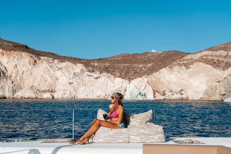 Santorini: Luxury Catamaran Cruise with Lunch, BBQ & Drinks - Sailing past the Red and White Beach areas (mostly photos, good reasons)