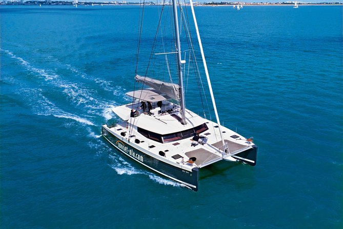 Santorini Luxury Catamaran Day Cruise with BBQ,drinks,transfer - Pickup, Ammoudi Port, and the 9:30 AM Rhythm