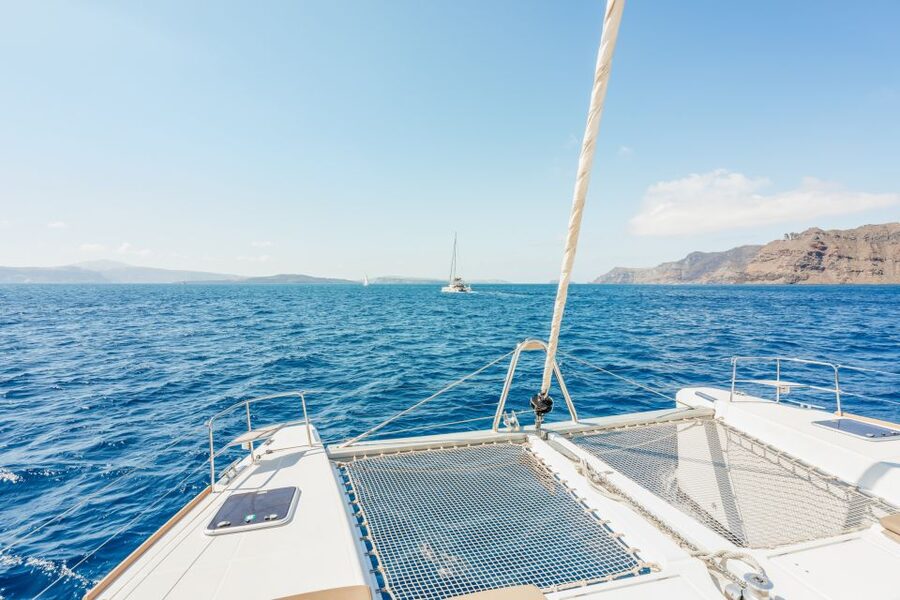 Santorini: Luxury Catamaran Day Trip with Meal and Open Bar - The swim-and-snorkel itinerary: Red Beach, White Beach, and why it’s set up to work