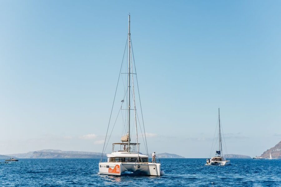 Santorini: Luxury Catamaran Day Trip with Meal and Open Bar - Pickup to port: the timing you should plan around