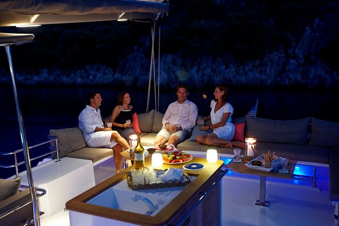 Santorini Luxury Catamaran Sunset Cruise with BBQ, Drink and Transfer - Hot Springs and the ancient lighthouse from sea level