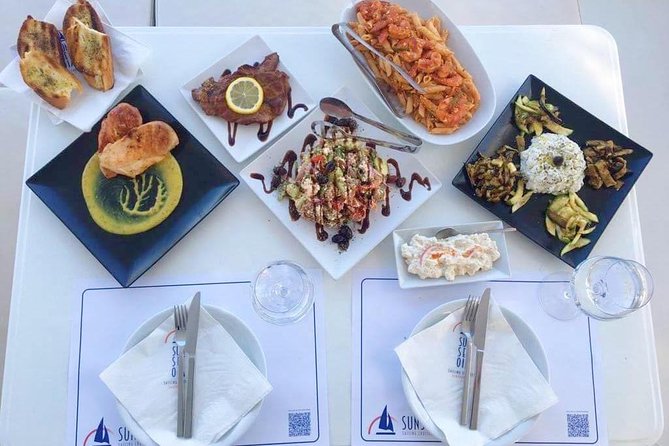 Santorini Luxury Catamaran Sunset Cruise with BBQ, Drink and Transfer - Volcano cruising: the calm part before the water stops
