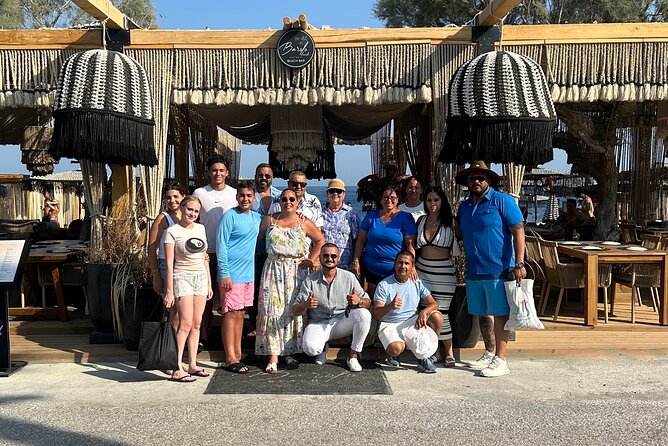 Santorini Luxury Private Island Tours by Golden Memories Tours - Perissa Black Sand Beach: swim break with a more local feel