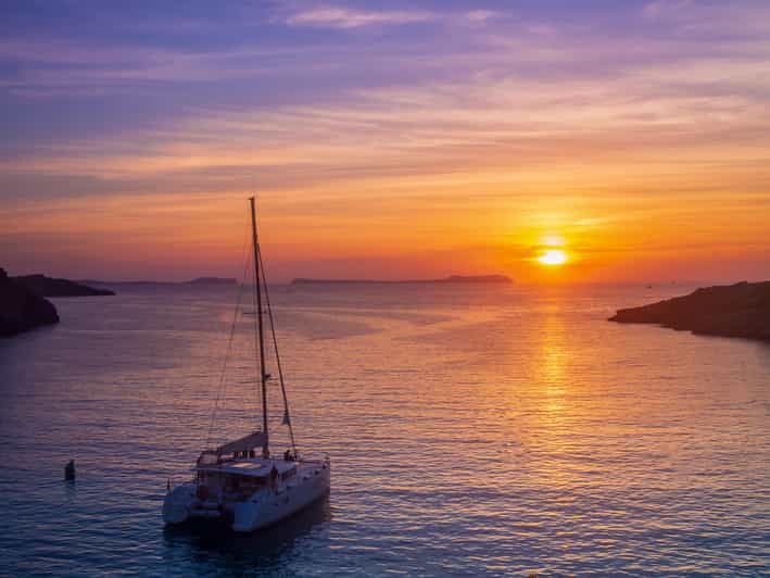 Santorini: Luxury Sunset Cruise with Dinner, BBQ, and Drinks - Vlychada pickup to a comfortable catamaran ride