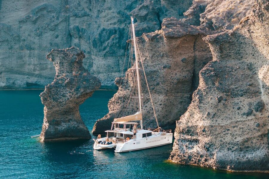 Santorini: Luxury Sunset Cruise with Dinner, BBQ, and Drinks - Palea Kameni hot springs: your sulfur soak moment