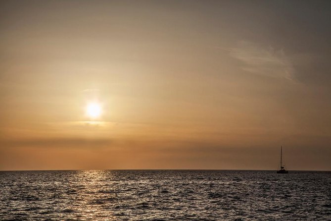 Santorini: Motor Yacht Sunset Cruise with 5-Course Dinner - Stop 2: Mesa Pigadia Beach (Around 2 Hours)