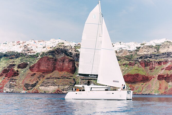 Santorini Oia: Caldera Classic Day Cruise with Snacks & Drinks - Onboard comfort: drinks, snacks, towels, and even bathrooms