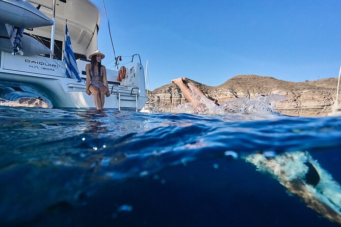 Santorini Oia: Caldera Private Day Cruise with BBQ & Drinks - Stop 1: Thirassia for calm swimming and snorkeling