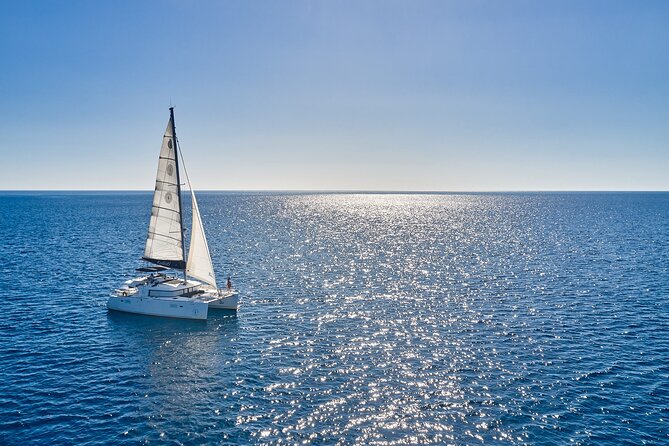 Santorini Oia: Caldera Private Day Cruise with BBQ & Drinks - Stop 2: Palea Kameni and the volcano-island atmosphere