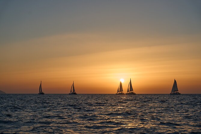 Santorini Oia: Luxury Sunset Cruise with Fresh Fish BBQ & Drinks - Thirassia: the calm swim stop near Oia that most people skip