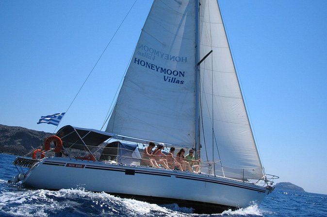 Santorini Oia: Private Sailing Yacht Cruise with Meal and Drinks - Lunch and drinks on board: Greek BBQ plus unlimited local favorites