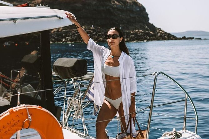 Santorini Oia: Private Sunset Catamaran Cruise with BBQ & Drinks - Thirassia stop: calm-water swim time near Oia