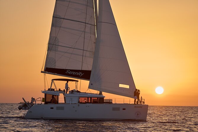Santorini Oia: Private Sunset Catamaran Cruise with BBQ & Drinks - Mesa Pigadia and White Beach: secluded coves that change what you thought you knew