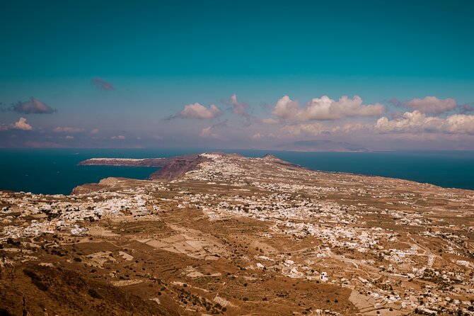 Santorini Panoramic Tour - Stop 2: Firostefani blue dome and the three-bell balcony (15 minutes)