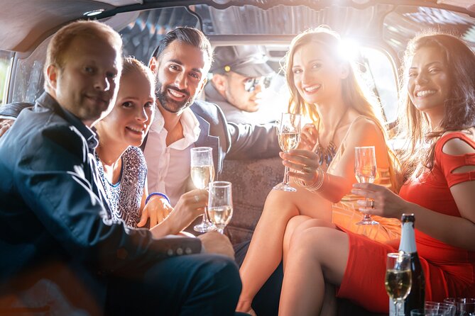 Santorini Party Bus Experience - The caldera-view stop: champagne, dancing, and a quick photo moment with payoff