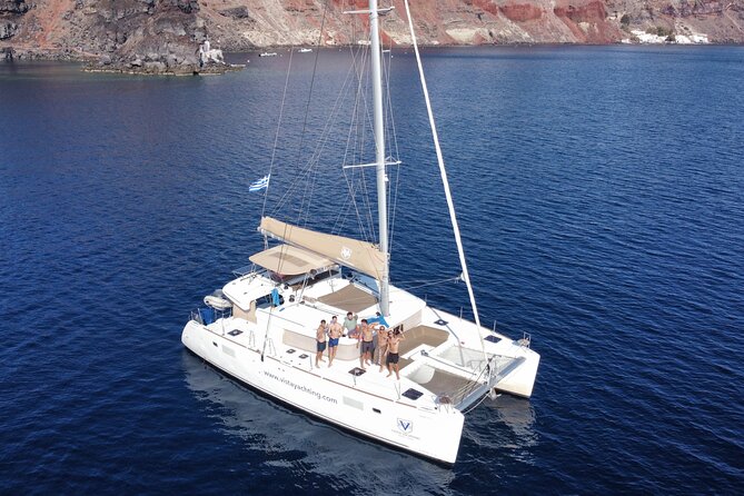 Santorini Platinum Catamaran Cruise with Meal, BBQ and Open Bar - Volcano hot springs: volcanic water and caves, in limited time