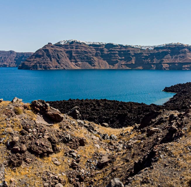 Santorini Port: 3 Hour Cruise to Volcano and Hot Springs - From Fira Old Port to the caldera: what the start feels like