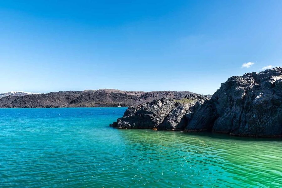 Santorini Port: 3 Hour Cruise to Volcano and Hot Springs - Nea Kameni: option crater hike, volcanic ground, and a small entry fee