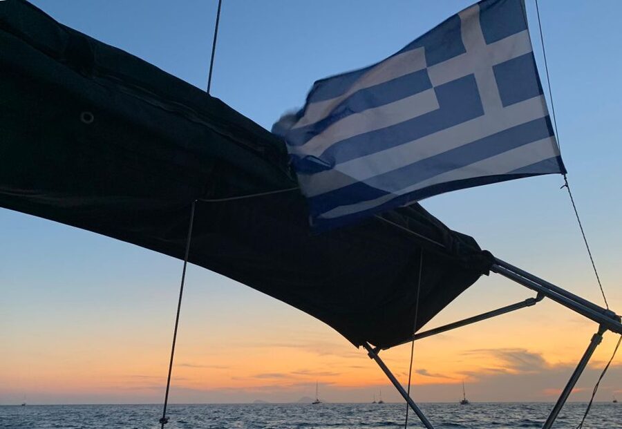 Santorini: Private 5-Hour Sunset Sailing Tour with Dinner - Into the Caldera: Lighthouse Views and the Approach to Hot Springs