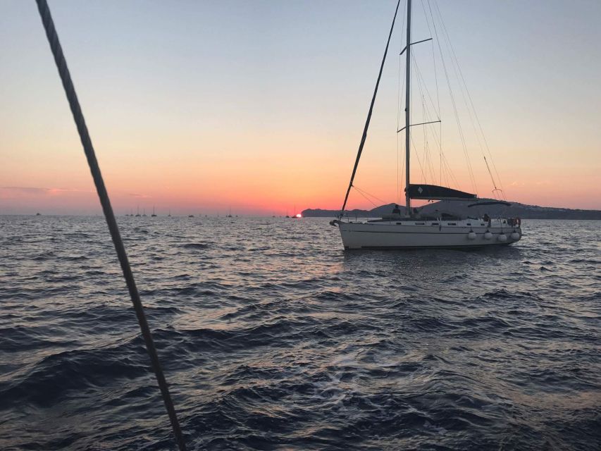 Santorini: Private 5-Hour Sunset Sailing Tour with Dinner - Dinner While the Villages Hang Over the Sea