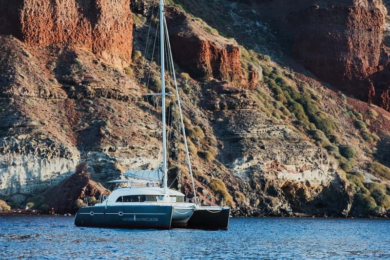 Santorini: Private Catamaran Cruise with BBQ Meal and Drinks - Thirassia and Manolas: sea views of a fishermen’s island