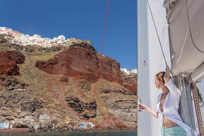 Santorini Private Catamaran Cruise with BBQ, Open Bar & Transfers - Mesa Pigadia Bay: a swim and relax session without beach logistics