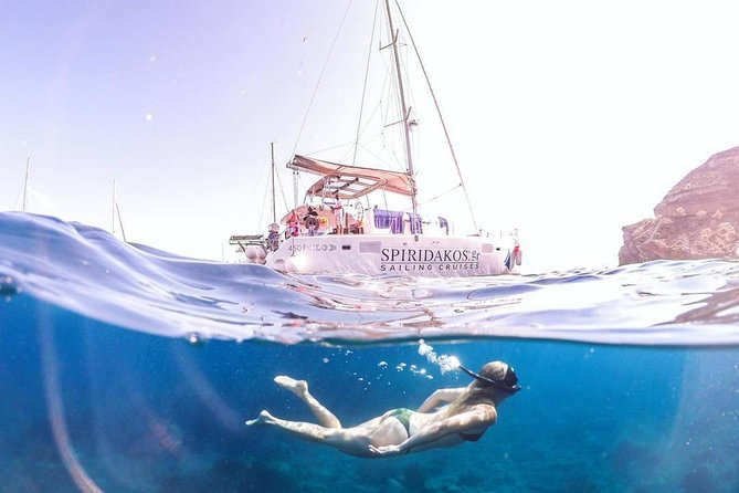 Santorini Private Catamaran Cruise with BBQ, Open Bar & Transfers - Getting picked up at Vlychada without stress