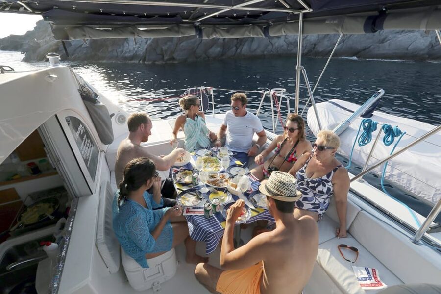 Santorini: Private Catamaran Cruise with Food & Drinks - Mésa Pigádia: your main swim, snorkeling, and (optional) sunset window