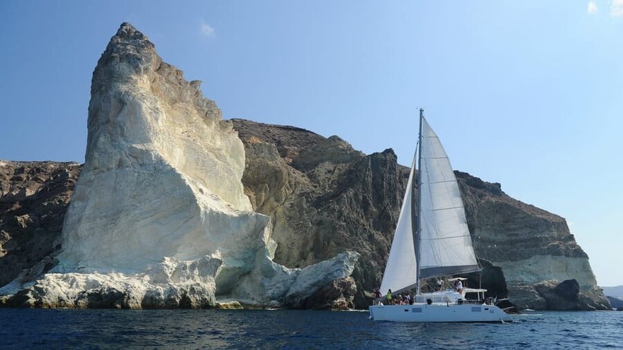 Santorini: Private Catamaran Tour with BBQ Meal and Drinks - What to bring: swim-ready packing and the no-shoes reality