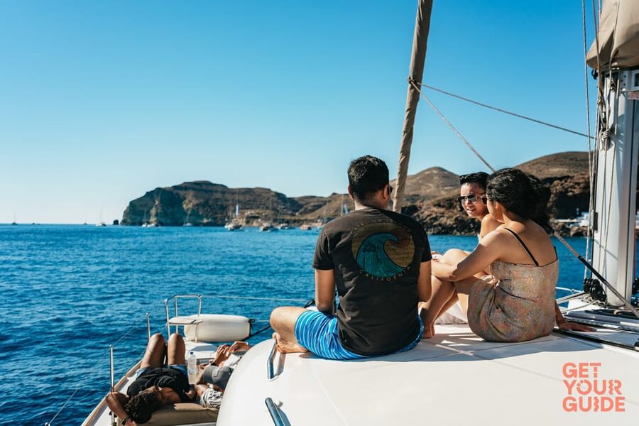 Santorini: Private Catamaran Tour with BBQ Meal and Drinks - Volcano hot springs and snorkeling: where the water turns sulfuric