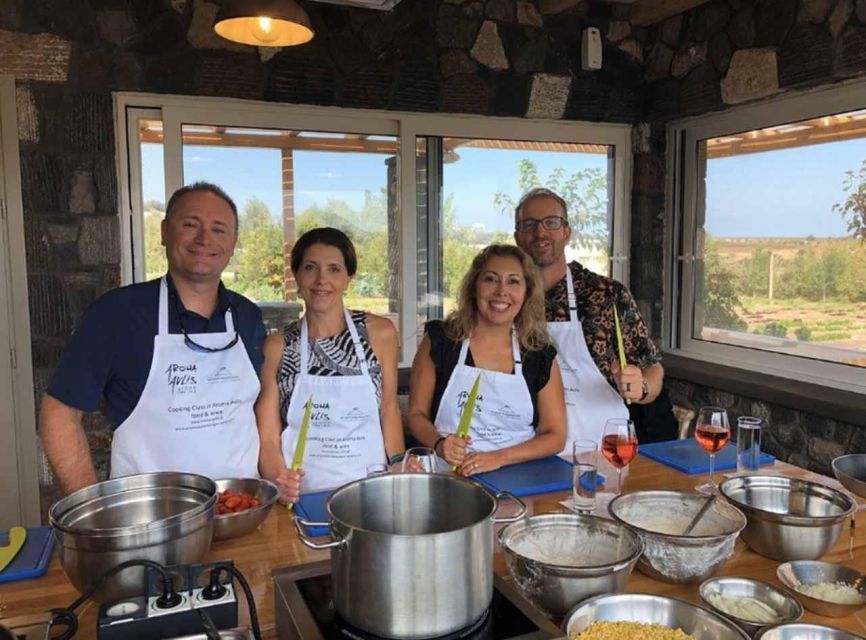 Santorini: Private Cooking Class and Wine Tasting Tour - Volcanic vineyards and basket vines: where the wine story starts