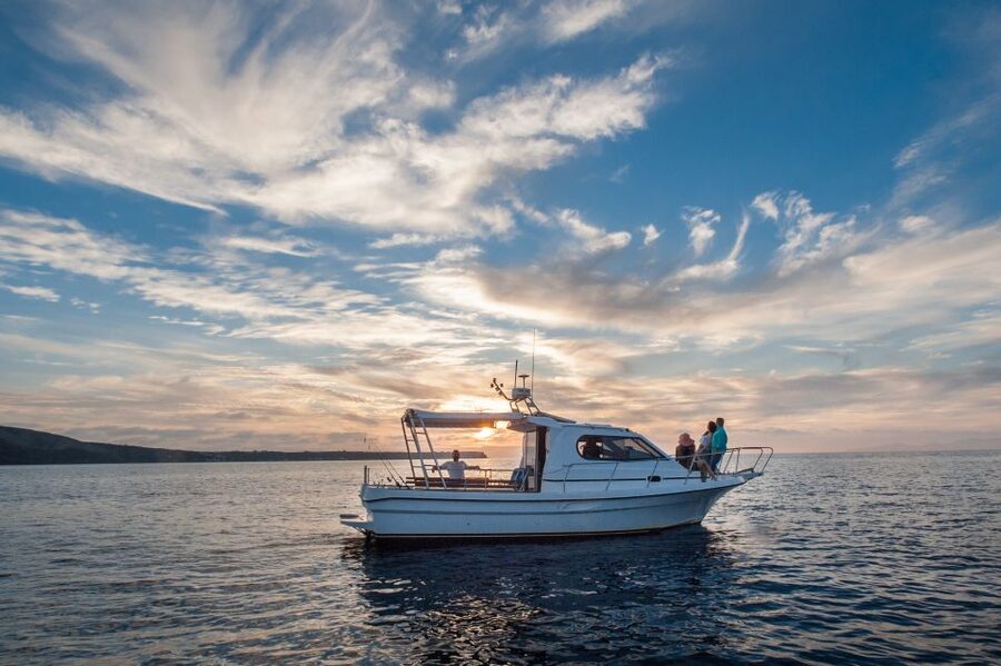 Santorini Private Cruise boat fishing tour - BBQ, Snorkeling - What happens once you cast a line with the pros