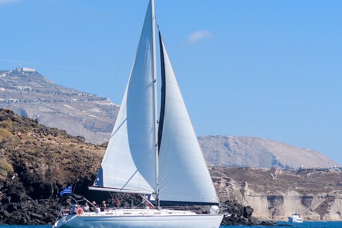 Santorini Private Daytime Sailing Cruise with Meal, Drinks &Transfer included - Thirasia Swim Bay: The Moment Santorini Changes from View to Experience