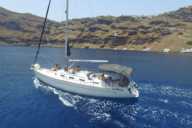 Santorini Private Daytime Sailing Cruise with Meal, Drinks &Transfer included - Volcano Crossing: Cape Lighthouse, Hot Springs, and Eastward Caldera Views