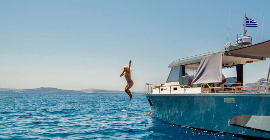 Santorini: Private Diamond 36 Motor Yacht Caldera Cruise - Fira dessert and onboard BBQ: the meal that turns the cruise into a day