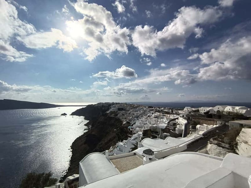 Santorini: Private Guided Sightseeing Day Tour - Oia on the north side: photos, shops, and caldera drama