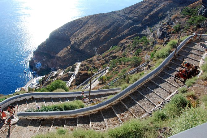 Santorini Private Scenic Shore Excursion: Oia, Mt Profitis and Ilias Monastery - What to budget beyond the tour price: monastery and cable car fees