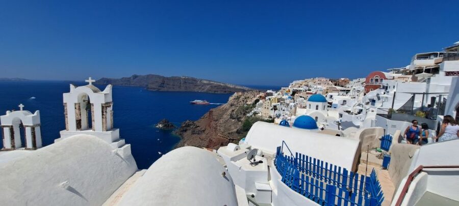 Santorini: Private Sightseeing Half-Day Tour - Oia: cave houses, blue domes, and the caldera framed the right way
