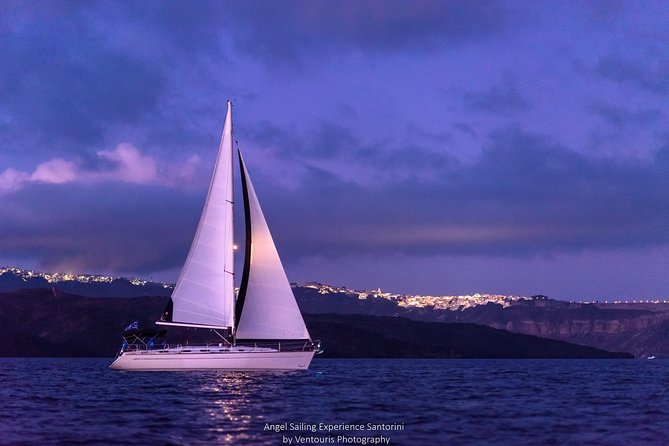 Santorini Private Sunset Sailing Tour with Dinner, Drinks &Transfer included - Volcanic beaches: Red Beach, White Beach, and the warm-water approach