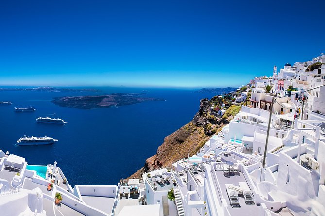 Santorini Private Tour 5hours Wine and local product tasting - Stop 1: Oia’s blue domes and caldera views in 45 minutes