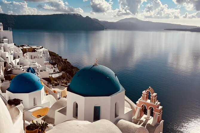 SANTORINI PRIVATE TOUR with Flexible Itinerary & Pickup - Oia Castle and the blue domes: your first hour for photos and perspective