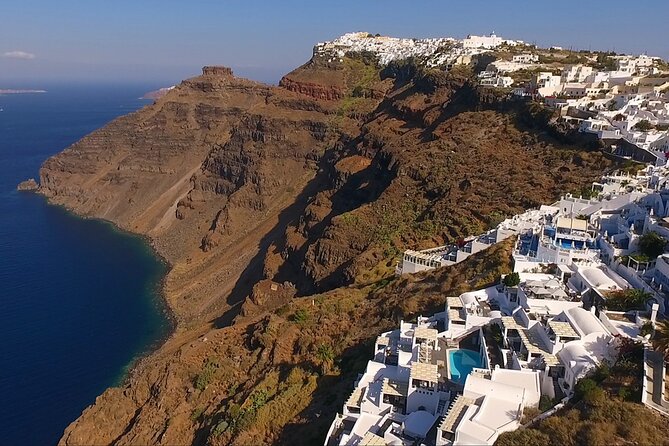 Santorini Private Wine Tasting Experience with private sommelier - Stop 2 in Exo Gonia: tradition, vinification, and cave-settlement history