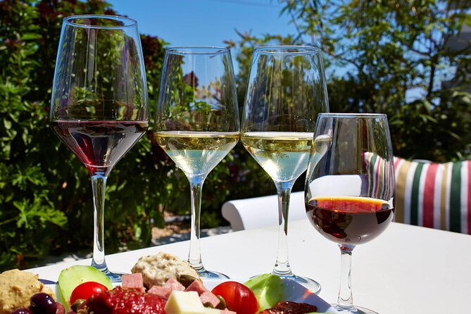 Santorini Private Wine Tasting Experience with private sommelier - Getting around: pickup, private vehicle comfort, and the Fira option