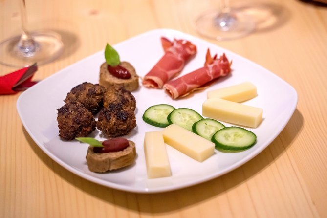 Santorini Private Wine Tour - Stop 3 at Venetsanos Winery: caldera and volcano views with familiar Santorini charm